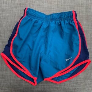🦋 blue + red Nike tempo shorts